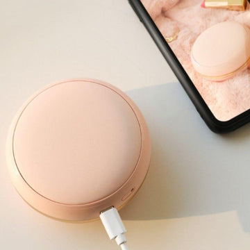 Cute power bank hand warmer shaped like pink macarons