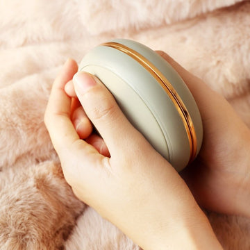 Cute power bank hand warmer shaped like green macarons