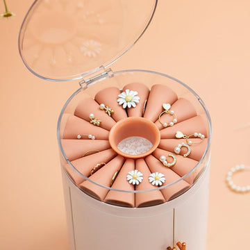 Multi-Layered Jewelry Organizer with earrings and rings on it