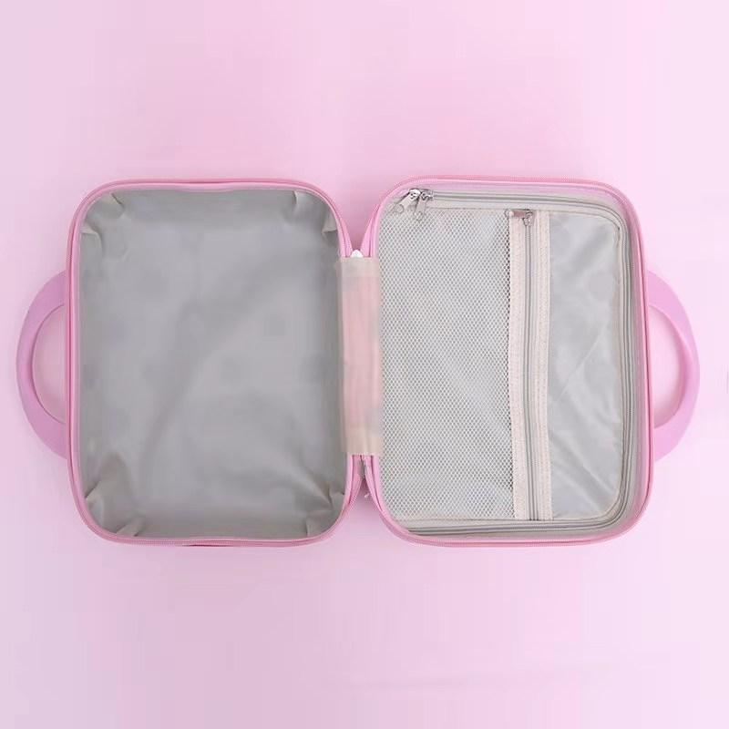 inside look of multi-functional mini suitcase in pink