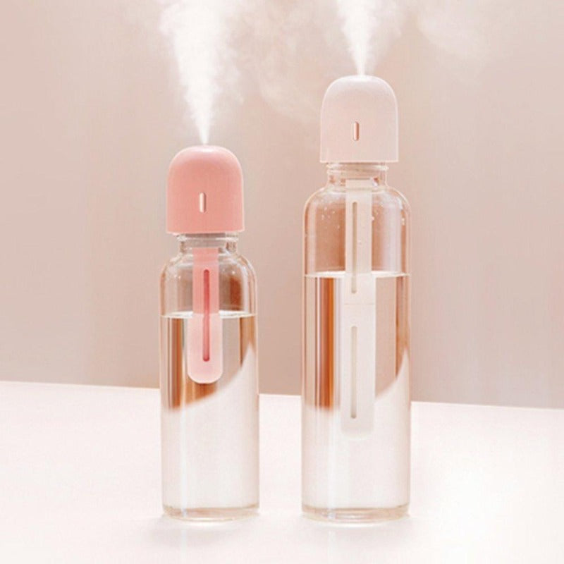 Portable mini humidifier in bottles of water