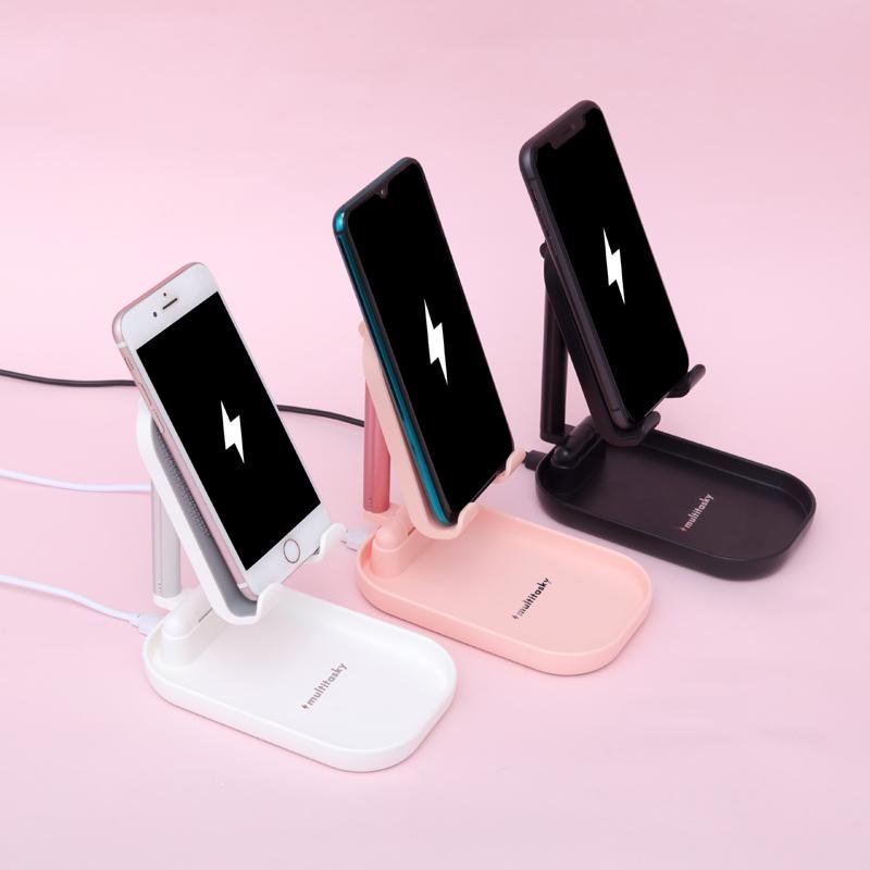 Charging stand for phone in pink, white, and black - Multitasky
