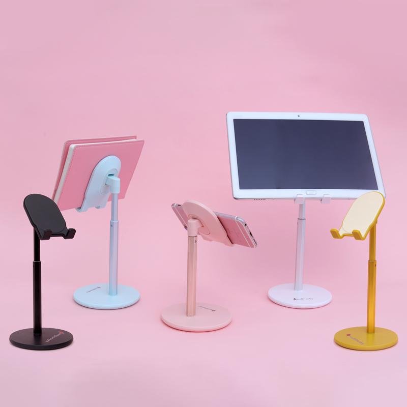 Cute phone stand in pink, black, yellow, and white