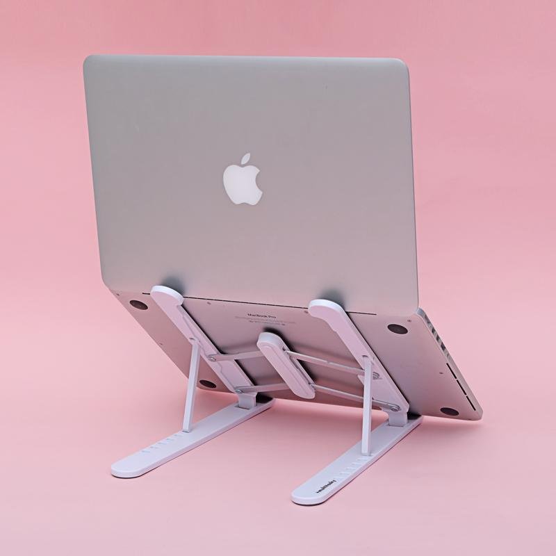 The portable laptop stand in white - back view 