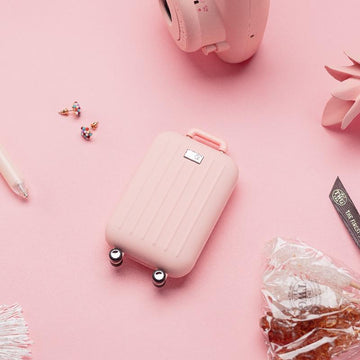 Cute traveler power bank with hand warmer shaped like a suitcase in pink