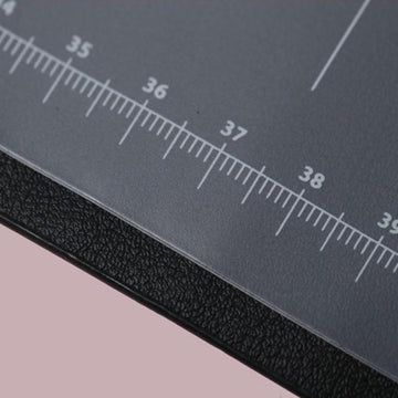 Black desk pad organizer with ruler