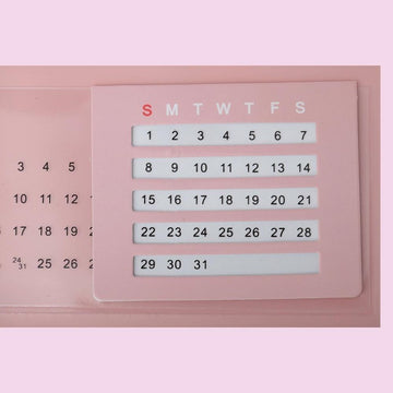 Pink desk pad organizer with calendar